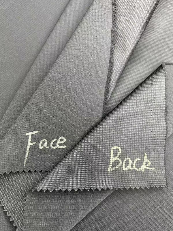Tecido texturizado de jacquard 100% poliéster de estiramento baixo com listras para jaquetas, calças, vestuário desportivo
