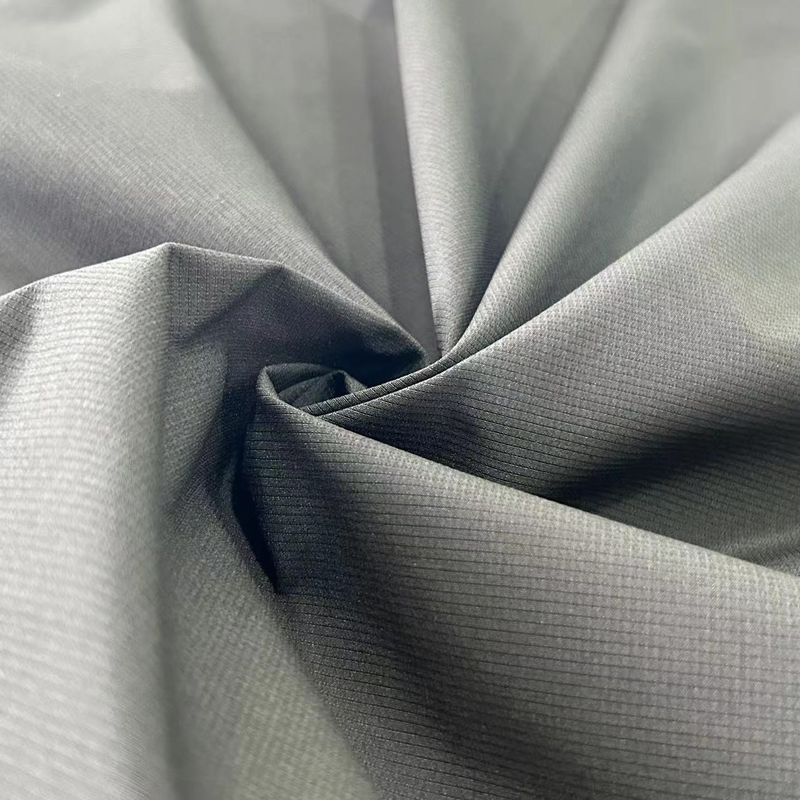 Tecido texturizado de jacquard 100% poliéster de estiramento baixo com listras para jaquetas, calças, vestuário desportivo