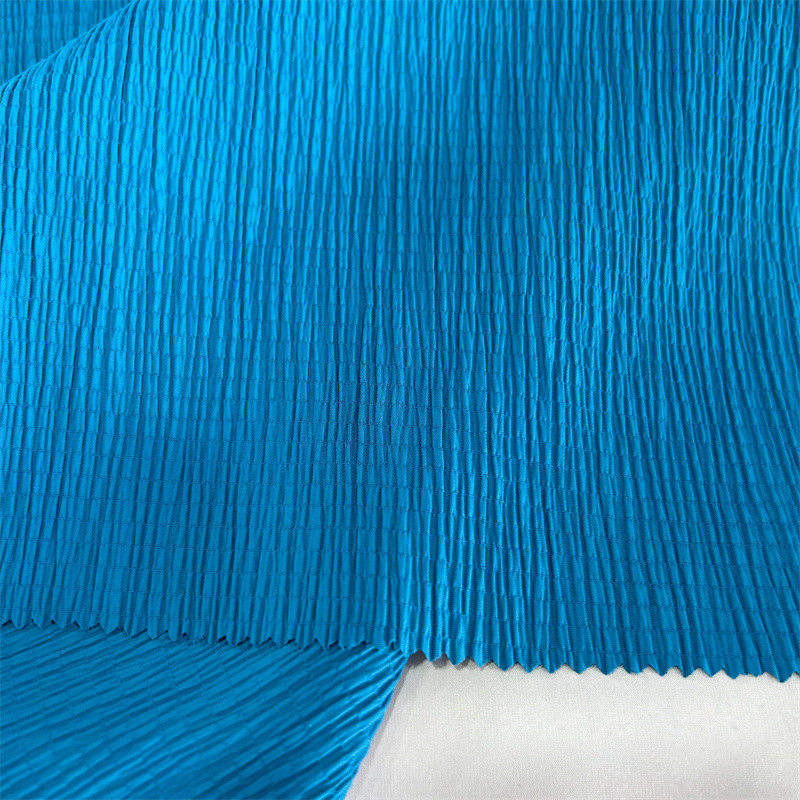 Tecido de malha de malha de borracha 96GSM 97% Nylon 3% Spandex para saias camisas