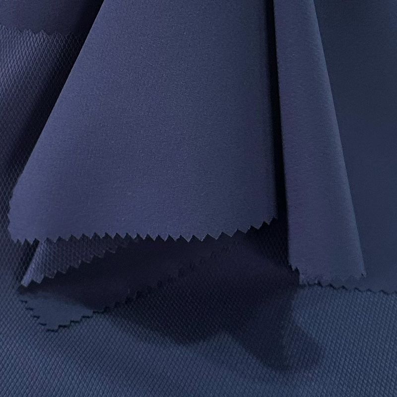 Tecido de alongamento de quatro vias com grelha de diamante 50D+20D*50D+20D/100D 140GSM 94% poliéster 6% spandex