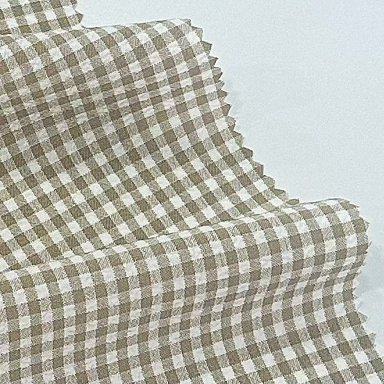 Tecido de poliéster catiônico com grelha de bolhas para vários produtos de vestuário