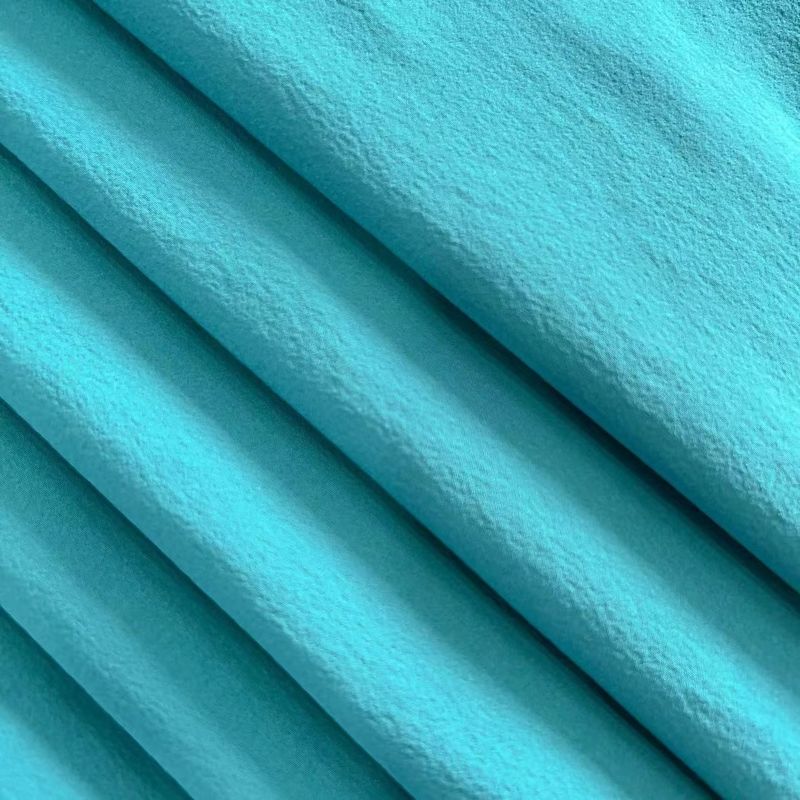 Tecido de spandex de nylon ligeiramente enrugado reciclado de 4 vias de alongamento 40D+20D*40D+20D 90GSM