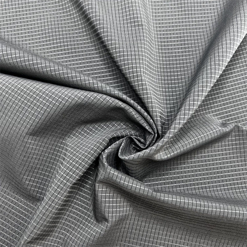 Tecido de grade oca de baixa elasticidade 75D T400 100% poliéster reciclado padrão de grade perfurada