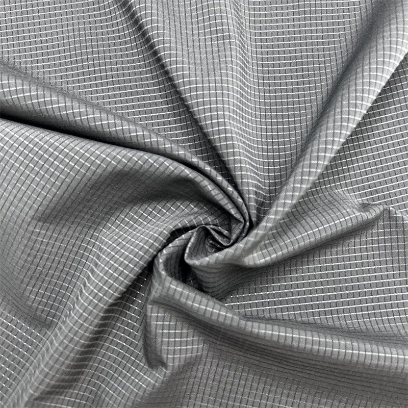 Tecido de grade oca de baixa elasticidade 75D T400 100% poliéster reciclado padrão de grade perfurada