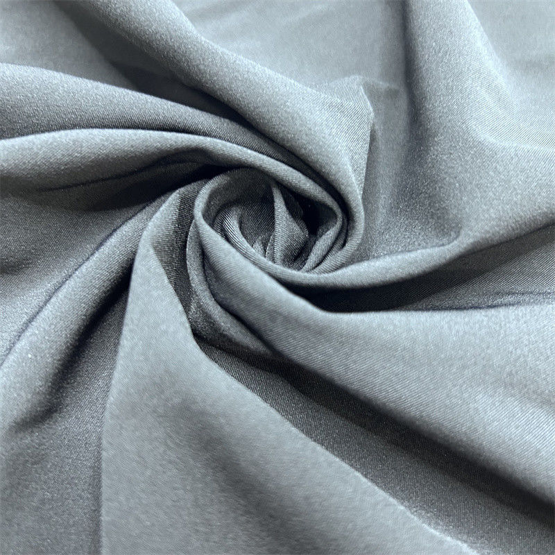 75D Tecido de poliéster espandêx reciclado Mate 2/1 Twill Four Side Elastic 75D+40D*75D+40D Superfície delicada
